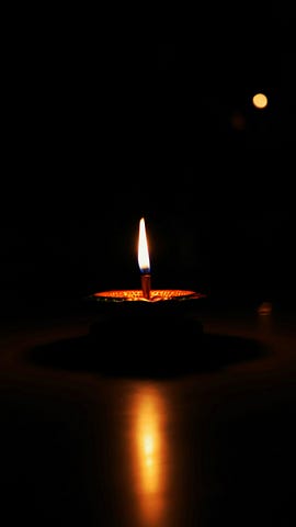 candle in a dark room