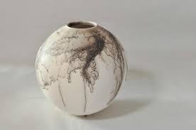 Circular vase fired with Raku technique