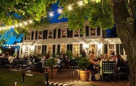 Exterior photo of the front patio of an upscale eatery in Wellfleet, Cape Cod