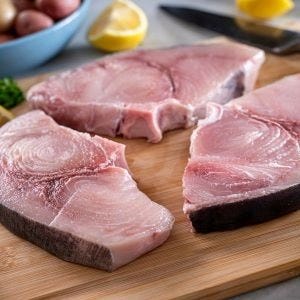 Swordfish fillets on a board - can be high in methylmercury