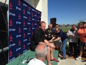 Dempster announcing his decision for 2014 (photo courtesy of Jason Mastrodonato)