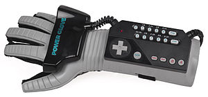 The Power Glove has a complex-looking controller on the wrist and the Dataglove’s fiber optic cables are hidden.