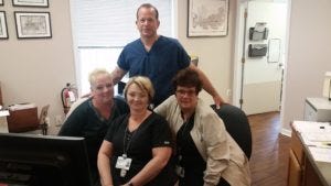 Dr. Avallone leans heavily on his loyal and professional staff Lori, Barbara and Patricia. Photo by Al Thompson 