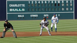 Johnson taking a big lead in a game against the Durham Bulls in Durham, NC in 2014. 