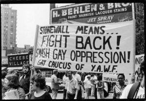 Members of YAWF (Youth Against War & Fascism) carry a banner in the Fifth Annual Gay Pride Day march (Gay Liberation Day), New York, New York, June 30, 1974. It reads 'Stonewall Means... Fight Back! Smash Gay Oppression!' (Photo by Fred W. McDarrah/Getty Images)