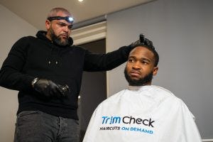 TrimCheck mobile barber getting a haircut