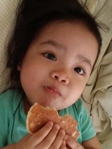 My daughter eating a pancake