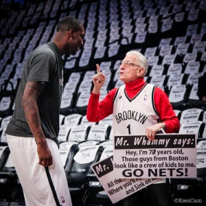 That's not Raptors' red under that Brooklyn jersey, is it? 