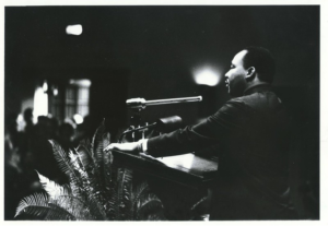 Dr. Martin Luther King Jr. speaking in Page Auditorium on November 13, 1964.