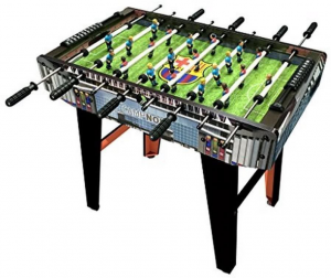 Photo of a foosball table made of black wood with a green table top.