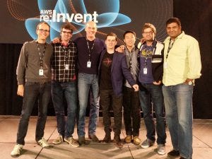 A photo of the Expedia Alexa team with Amazon Alexa VP Mike George