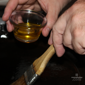 Brush olive oil over the entire inside surface of the pan.