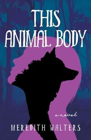 The cover of a book called This Animal Body with a silhouette of a woman’s head behind the silhouette of a wolf’s head.