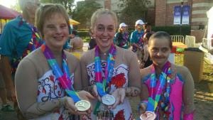 From left, Emily Boycott and Christina Judd Campbell of Team Canada; and Gizela Billikova of Slovakia.