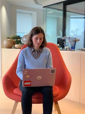 Photograph of Mathilde working in the LEGO Group office