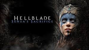 Text reading ‘Hellblade, Senua’s Sacrifice’ next to a woman with a headress & blue makeup looking upwards resolutely.