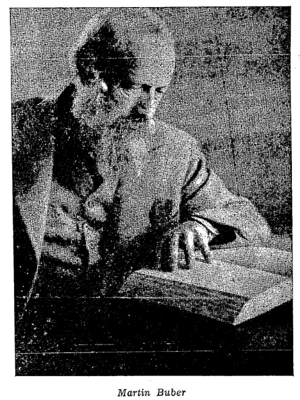 Photo of Martin Buber looking down at an open book (NN, Public domain, via Wikimedia Commons at https://commons.wikimedia.org/wiki/File:Martin_Buber_5.jpg)