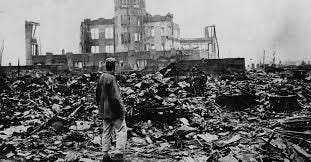 Man watching the destroyed city of Hiroshima, post atomic bombing