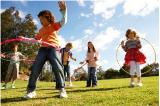 Childrens playing sports on ground