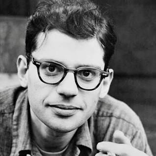 A black and white photo of Allen Ginsberg