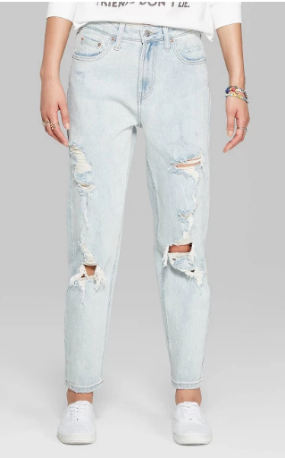 Light wash mom jeans with rips in the front.