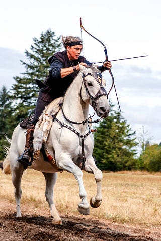 Horse rider with bow and arrow