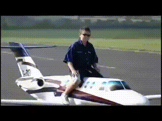 A man on a small plane by himself