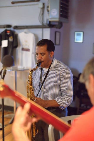 PHOTO COURTESY OF MIKE MAHOMET  Round Guys Brewery hosts a weekly Jazz Jam. Saxophonist Trevor Kelly is shown during recent performance at the Lansdale microbrewery. 
