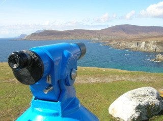Tower viewer looking out over a body of water towards a mountain