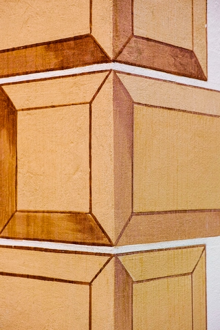 drawing of three brown boxes stacked upon each other
