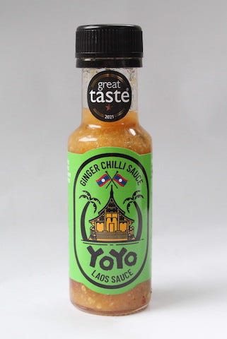 Bottle of ginger chilli sauce, branded Yoyo Laos Sauce