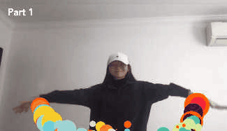 A gif of a person waving their arms up and down. Algorithmically generated colorful dots trail behind their hands.