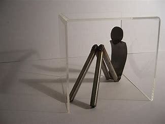 Image of person in glass box