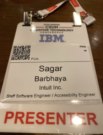 Sagar Barbhaya’s ID card for the conference with presenter written on it