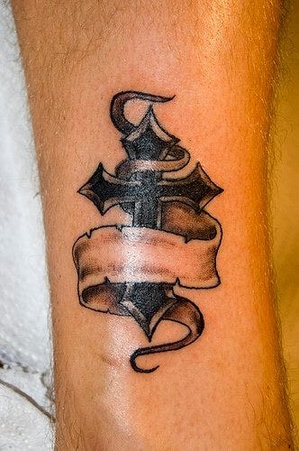 1075 ankle tattoo