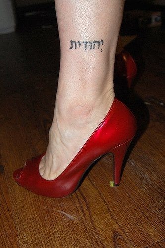 1034 ankle tattoo