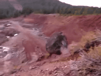 A boulder rolling down a hill