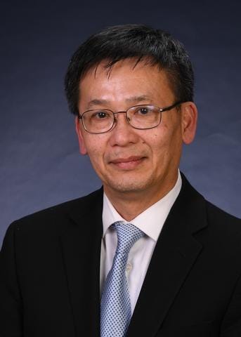 Long Phan poses for a head shot.