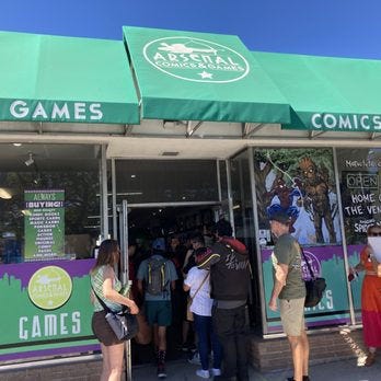 Customers walking into Arsenal Comics in Ventura, CA.