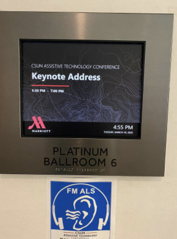 Electronic board outside the room with keynote address 5.30pm -7pm written on it