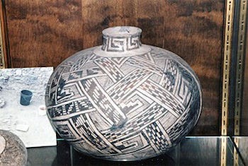 Native American pot painted with black and white designs