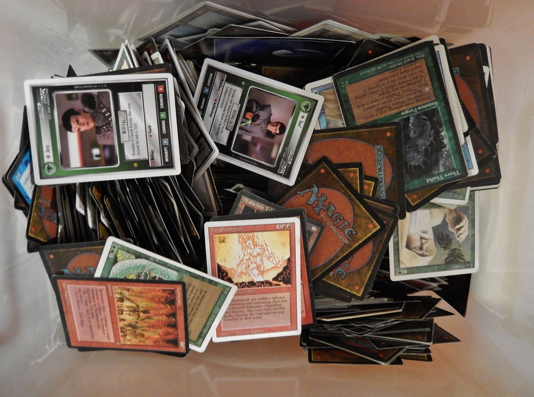 A box of unsorted magic cards © CC BY-SA 2.0 [https://www.flickr.com/photos/mikecogh/15225553495](https://www.flickr.com/photos/mikecogh/15225553495)