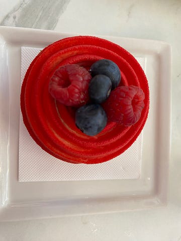 Red cake with berries