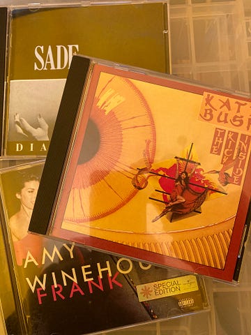 Authors photo of their copies of the CD albums, Diamond Life by Sade, The Kick Inside by Kate Bush and Frank by Amy Winehouse