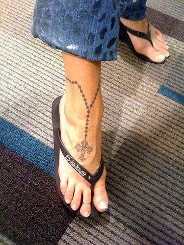 1040 ankle tattoo