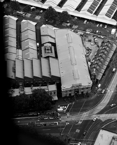 An aerial greyscale photo of Vic Market.