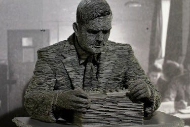 Statue of Turing at Bletchley Park, built from half a million pieces of Welsh slate.