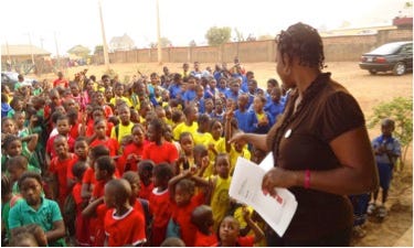 Abosede “Bose” Olotu speaking at an HIV education and advocacy event in Nigeria.