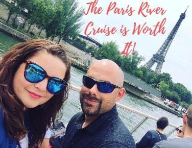 Couple on boat in front of the Eiffel Tower