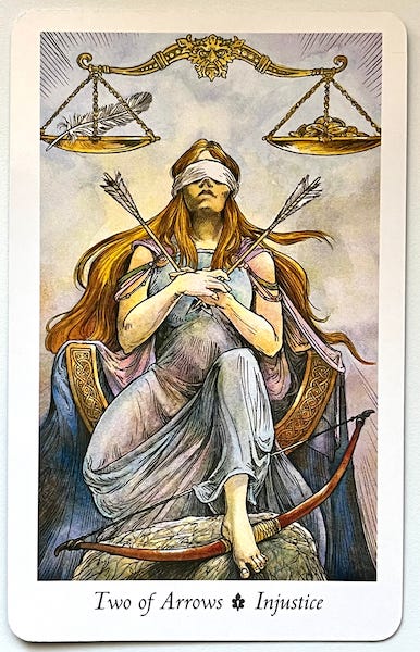 Two of Arrows — Injustice from the Wildwood Tarot